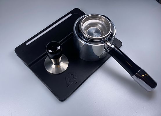 Tamper mat with integrated force sensor and LED display when optimum tamper pressure is reached. Tamper mat with integrated force sensor and LED display when optimum tamper pressure is reached.