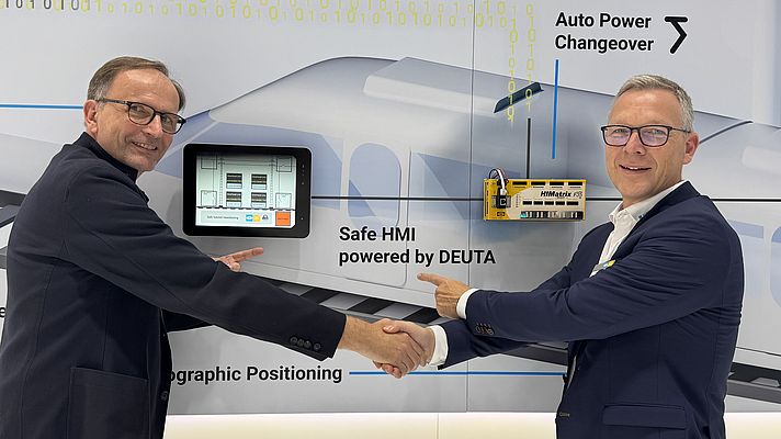 SafeHMI was announced at Innotrans 2024 in Berlin. (fltr) Dr Rudolf Ganz, CEO of the DEUTA Group and DEUTA-WERKE, and Jörg de la Motte, CEO of the HIMA Group (Image: HIMA Group) SafeHMI was announced at Innotrans 2024 in Berlin. (fltr) Dr Rudolf Ganz, CEO of the DEUTA Group and DEUTA-WERKE, and Jörg de la Motte, CEO of the HIMA Group (Image: HIMA Group)