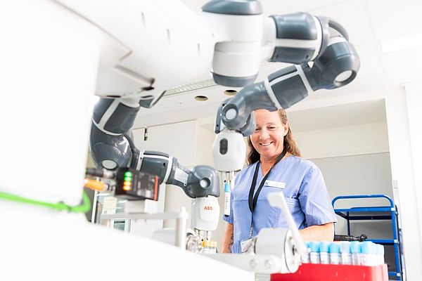 Collaborative YuMi robot handling medical samples at Karolinska Hospital. source: ABB