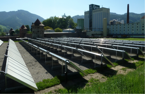 1,500m² flat plate collector field with 200m³ solar energy storage and brewery building complex (source AEE INTEC)
