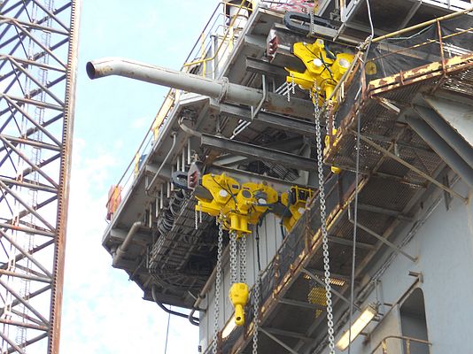 BOP handling air operated hoists being mounted on the Maersk offshore rig Guardian.