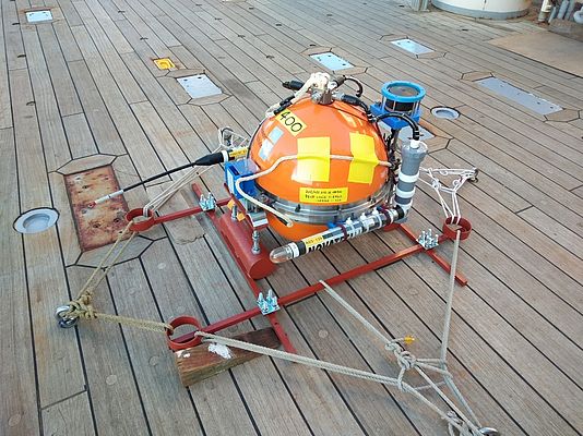 Figure 3. Free-fall pop-up type ocean bottom device equipped with the new water pressure gauge used for the evaluation on the seafloor