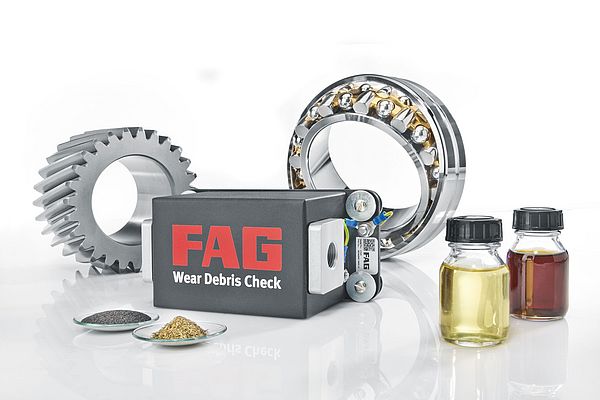 The FAG Wear Debris Check monitors the increase in particlulates or contaminants in oil circuits in, for example, industrial gearboxes and evaluates this information by the material and its size.
