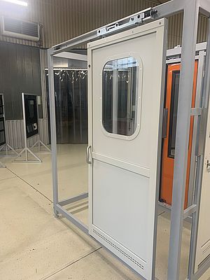 Lightweight, compound aluminum separating and passage doors in flat and bent designs are part of Metal 99’s product portfolio for European railway companies