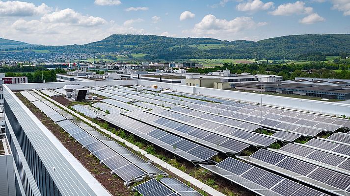 Photovoltaic systems on the roofs of many company buildings generate solar energy and help reaching the goals.