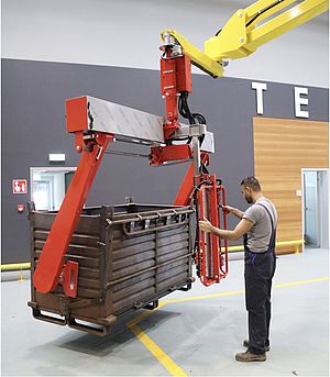 Manipulateur industriel pneumatique pour la prise de containers métalliques